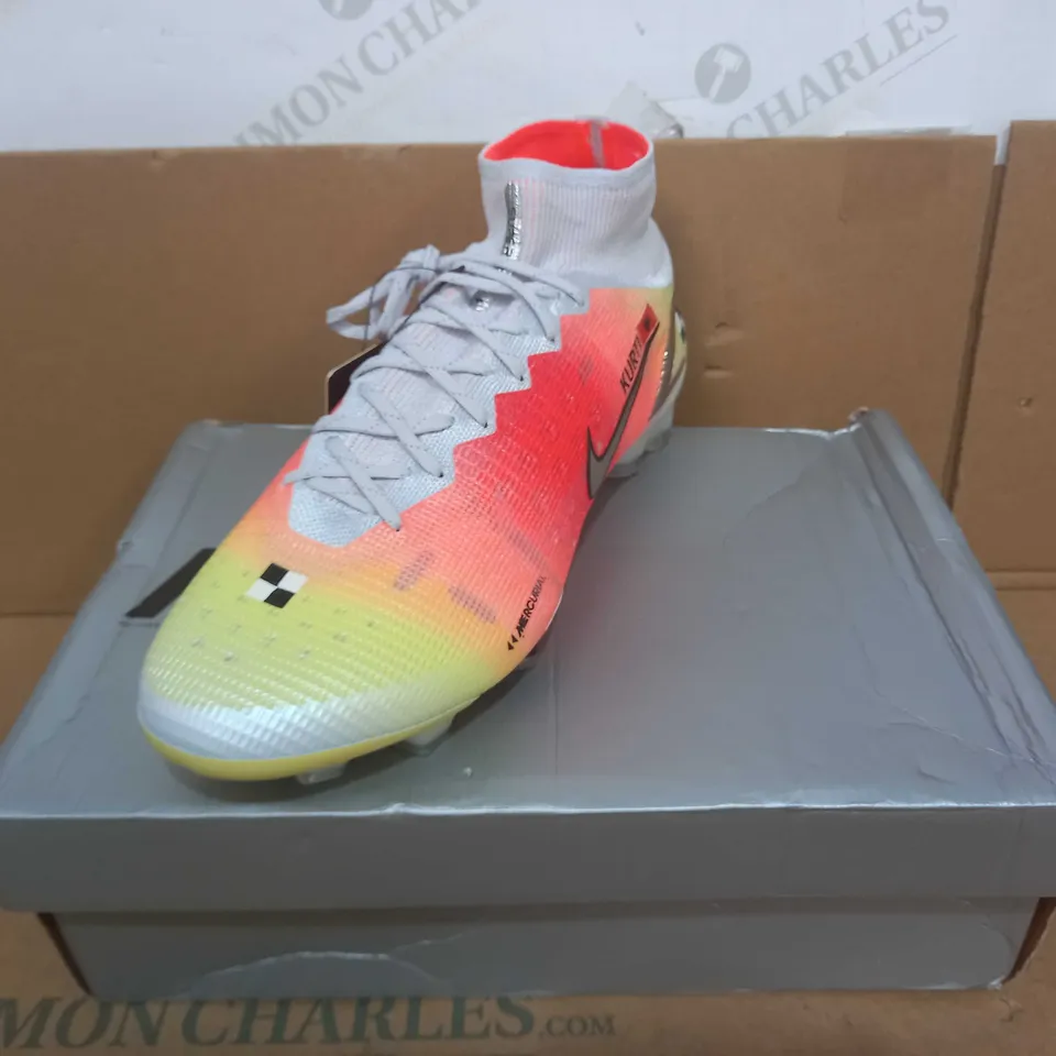 BOXED PAIR OF DESIGNER FOOTBALL SHOES IN THE STYLE OF NIKE SIZE UNSPECIFIED