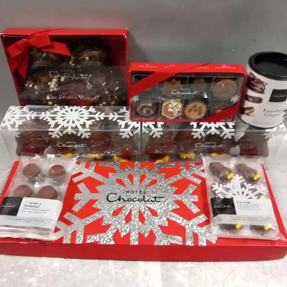 APPROXIIMATELY EIGHT ASSORTED HOTEL CHOCOLAT PRODUCTS TO INCLUDE; ENROBED GINGER, THE FESTIVE WREATH, CLASSIC CHRISTMAS, A POSSE OF PENGUINS AND CARAMEL