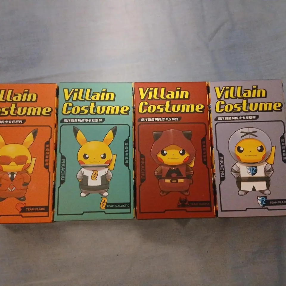 POKEMON VILLAIN COSTUME PIKACHU – SET OF 4 BOXED ITEMS WITH CARTOON ARTWORK
