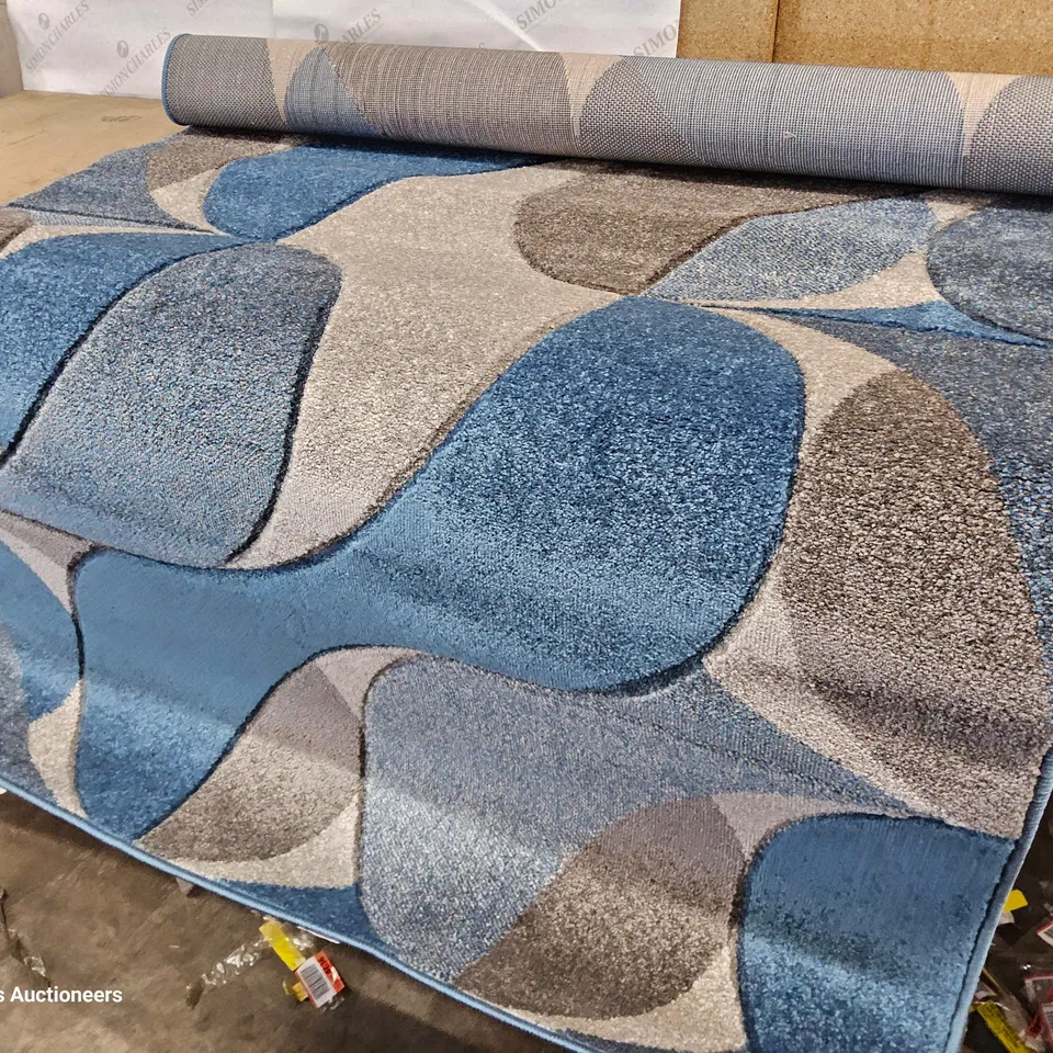 ABSTRACT MACHINE WOVEN BLUE AREA RUG 120 × 170
