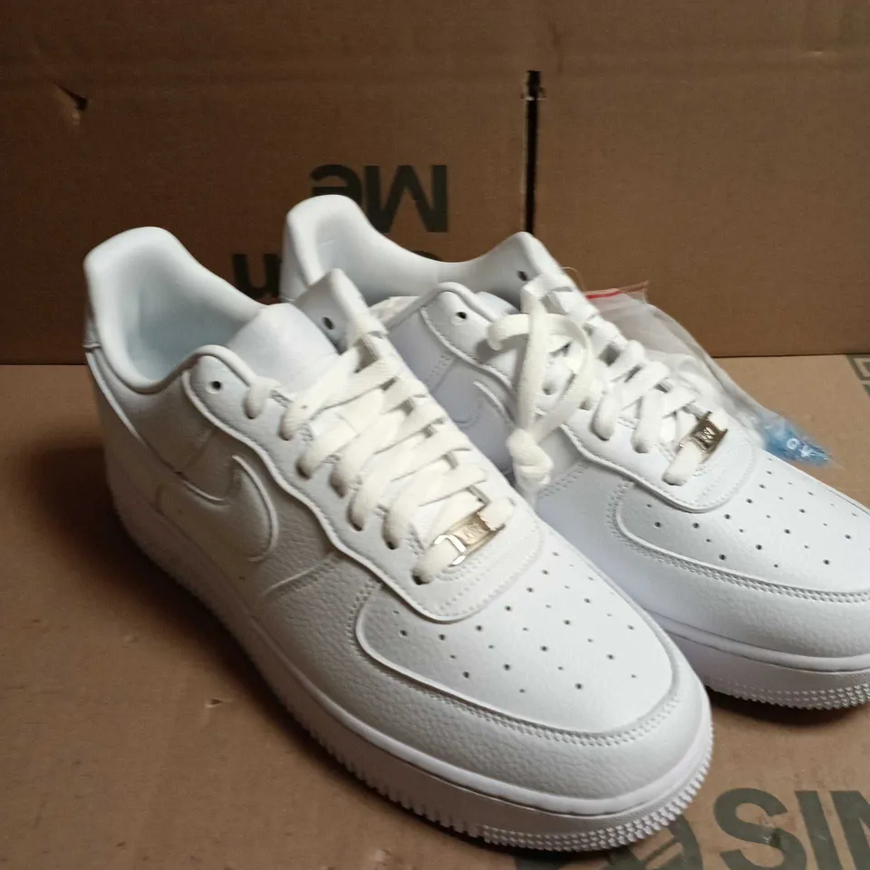 PAIR OF NIKE AIR FORCE 1 LOW WHITE LEATHER SNEAKERS – UK 9 