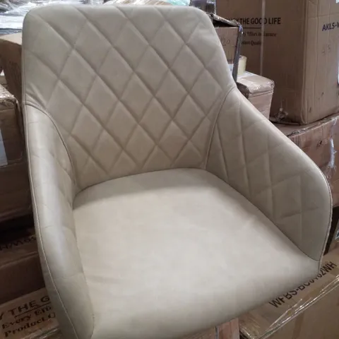 BOXED PAIR OF SOFT FAUX LEATHER UPHOLSTERED BEIGE SIDE/DINING CHAIRS.