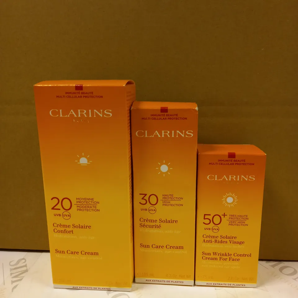 LOT OF 3 CLARINS SUN CARE PRODUCTS TO CONTAIN SUN CARE CREAM & SUN WRINKLE CONTROL