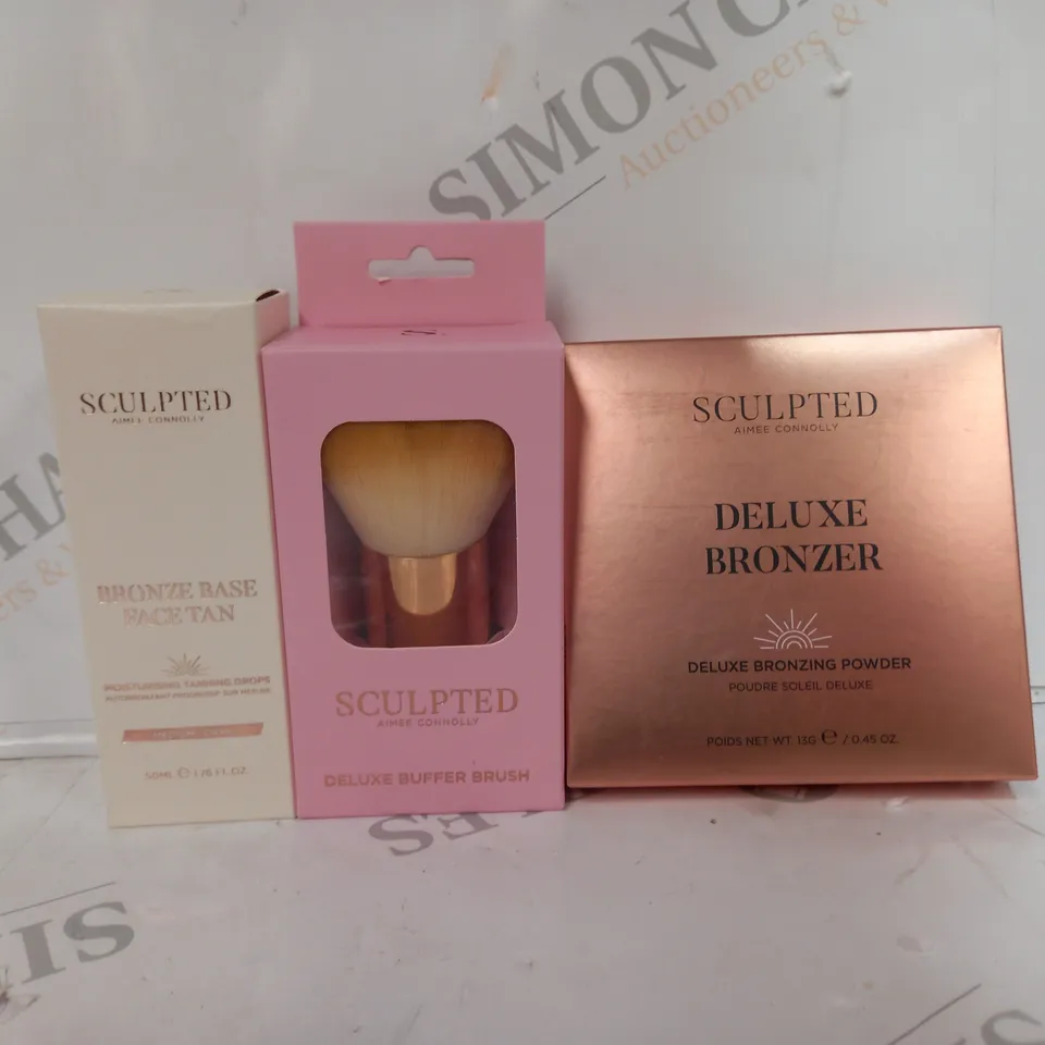 SET OF 3 SCULPTED ITEMS TO INCLUDE - DELUXE BRONZER - BRONZE BASE FACE TAN - BUFFER BRUSH 