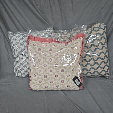 5 ASSORTED CUSHIONS OF VARIOUS STYLES, SIZES AND COLOURS. SEALED