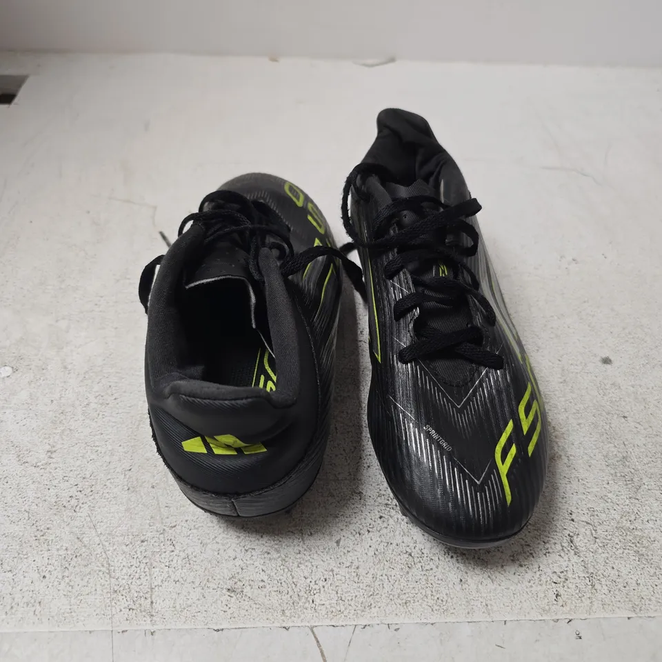 Football boots – black with neon detailing