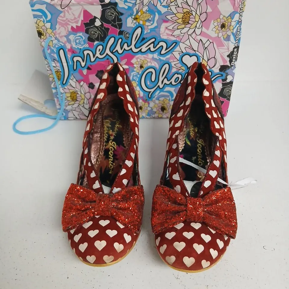 IRREGULAR CHOICE WOMEN'S RED HEART PATTERN HEELS WITH GLITTER BOW – STAGE LEFT SIZE 42