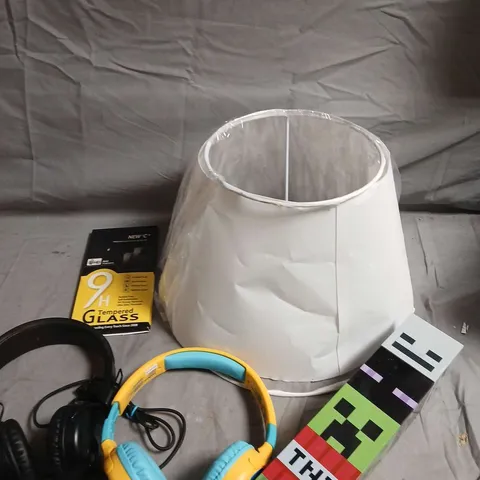 APPROXIMATELY 7 ASSORTED HOUSEHOLD PRODUCTS TO INCLUDE HEADPHONES, GLASS PROTECTOR, LIGHT SWITCH ETC