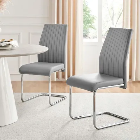 BOXED LOREN FAUX LEATHER DINING CHAIRS WITH CHROME LEGS