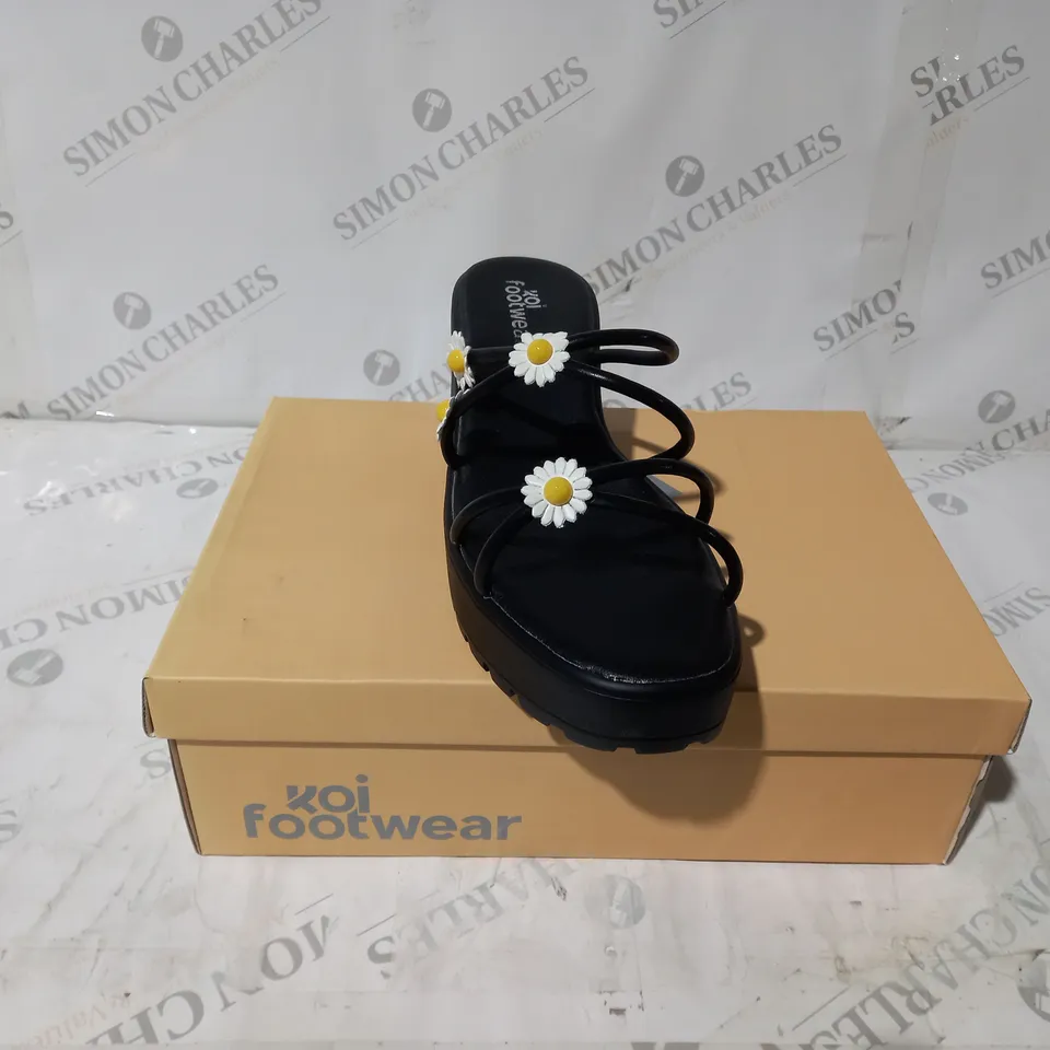 BRAND NEW BOXED PAIR OF KOI VEGAN LEATHER BLOOMING DAISY OASIS STRAPPY SLIDERS IN BLACK UK SIZE 9