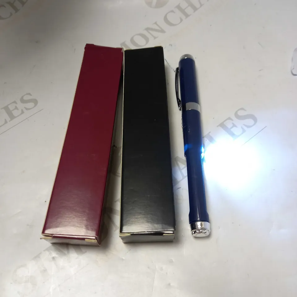 SET OF BELL HOWELL LIGHT UP PENS