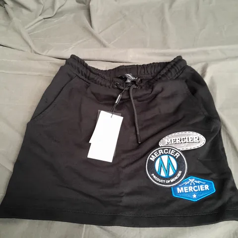 MERCIER XS OG BADGE MINI SKIRT