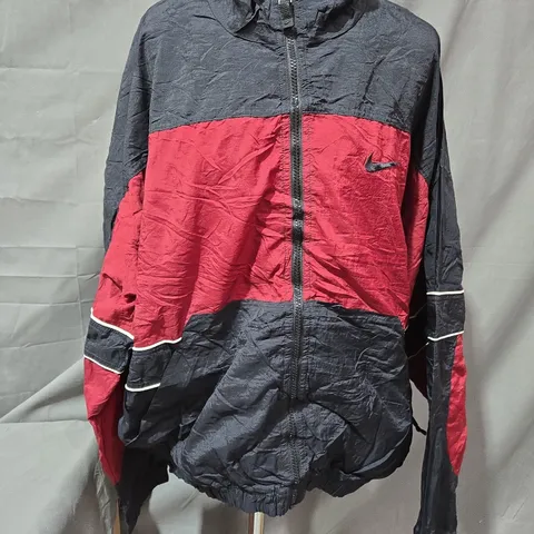 NIKE WINDBREAKER JACKET IN MULTI SIZE M