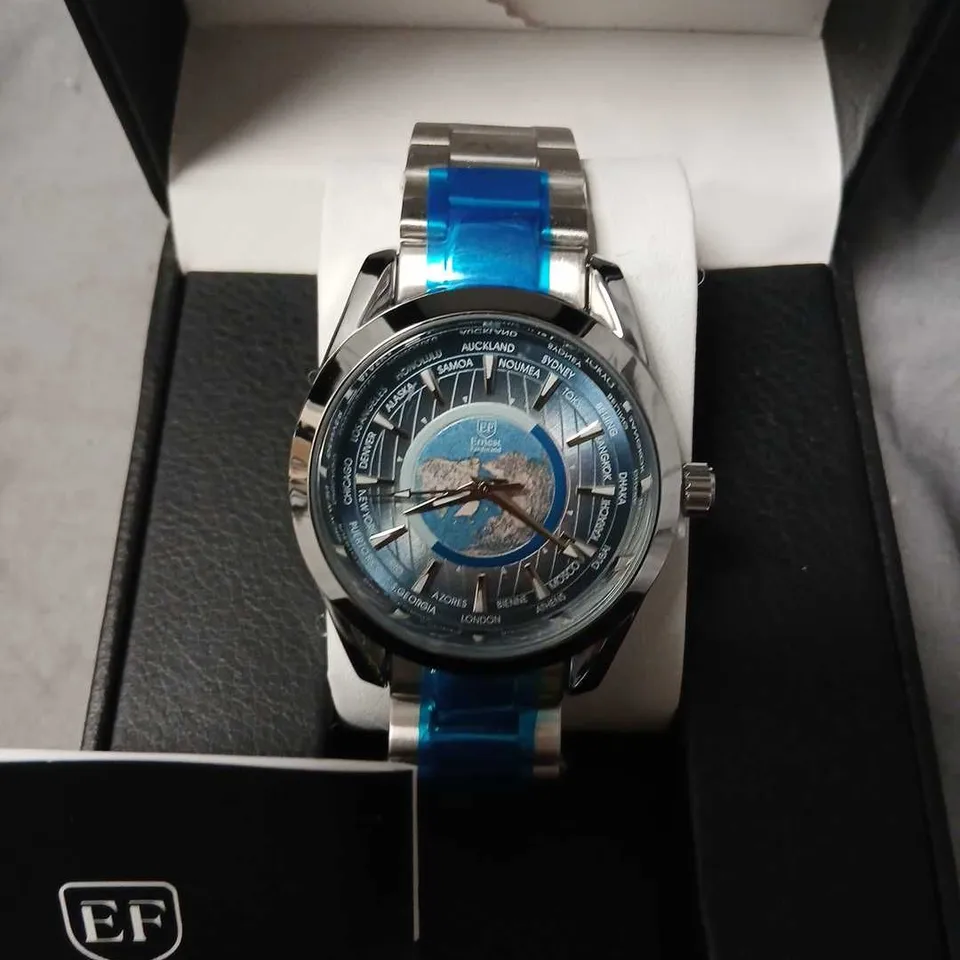 ERNEST FERDINAND WORLD TIME WRISTWATCH – STAINLESS STEEL, BLUE ACCENTS, BOXED