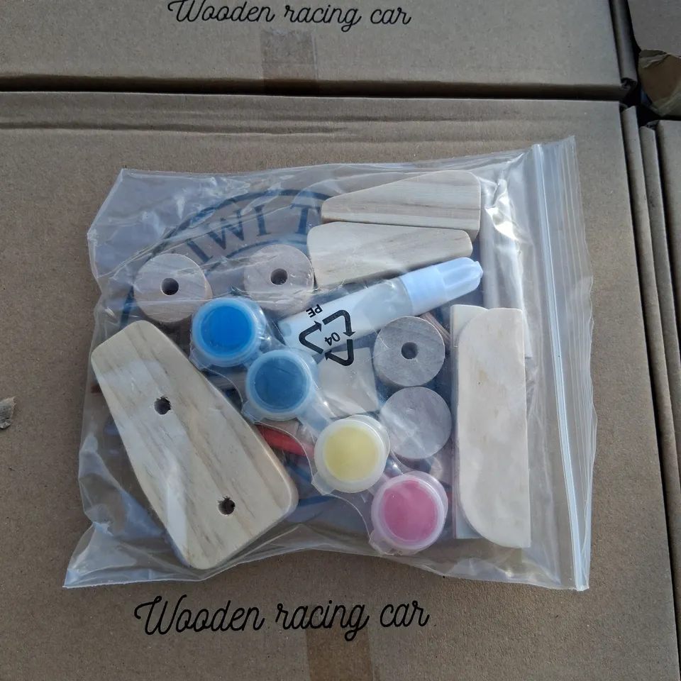 APPROXIMATELY 60 BRAND NEW BOXED KIWI TOYS WOIDEN RACING CARS