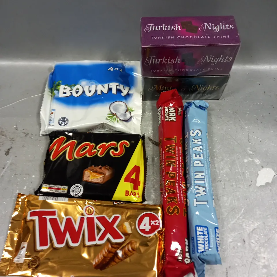 APPROXIMATELY  ASSORTED CHOCOLATE PRODUCTS TO INCLUDE BOUNTY BARS, TURKISH THINS, TWIN PEAKS NOUGAT ETC 