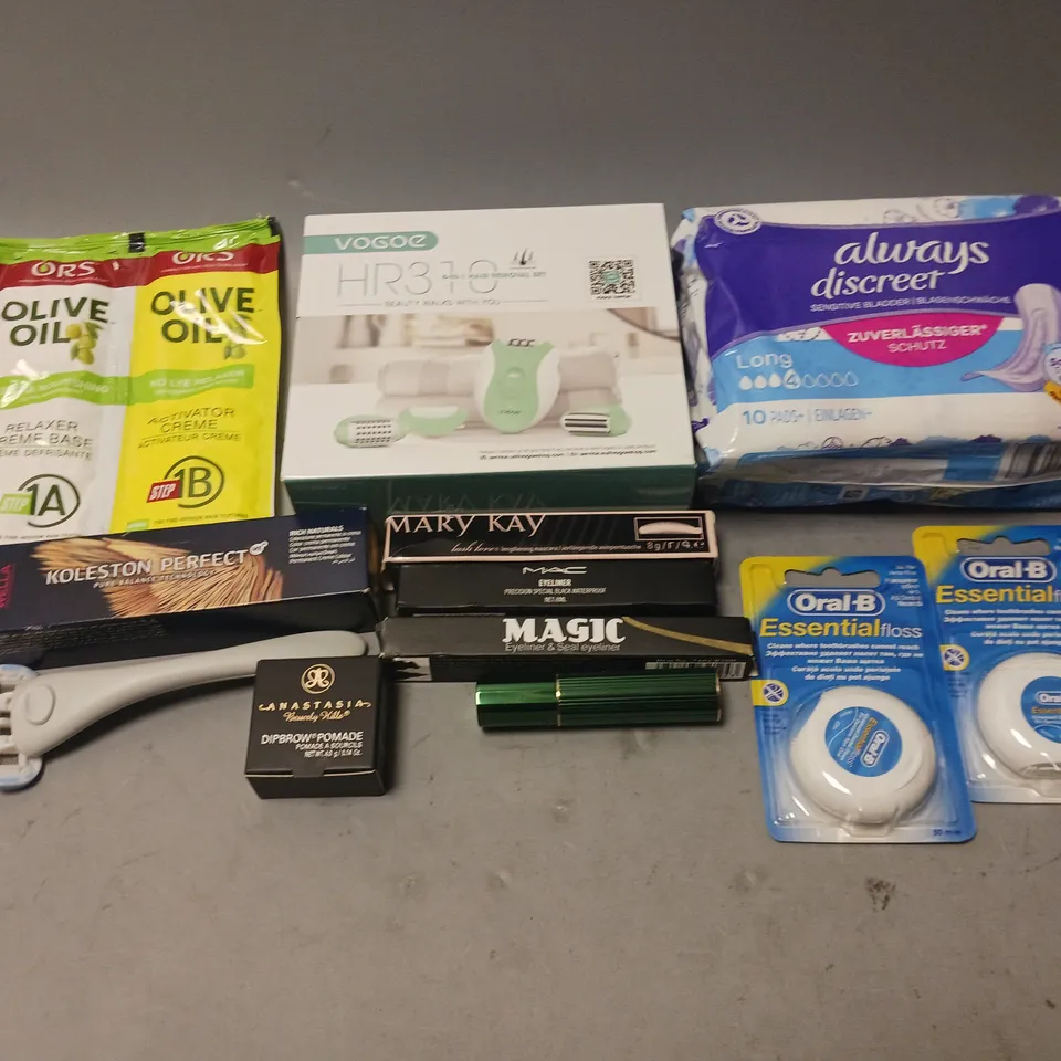 BOX OF APPROXIMATELY 20 COSMETIC ITEMS TO INCLUDE - PADS, FLOSS, RAZOR, AND OLIVE OIL MASK ETC.