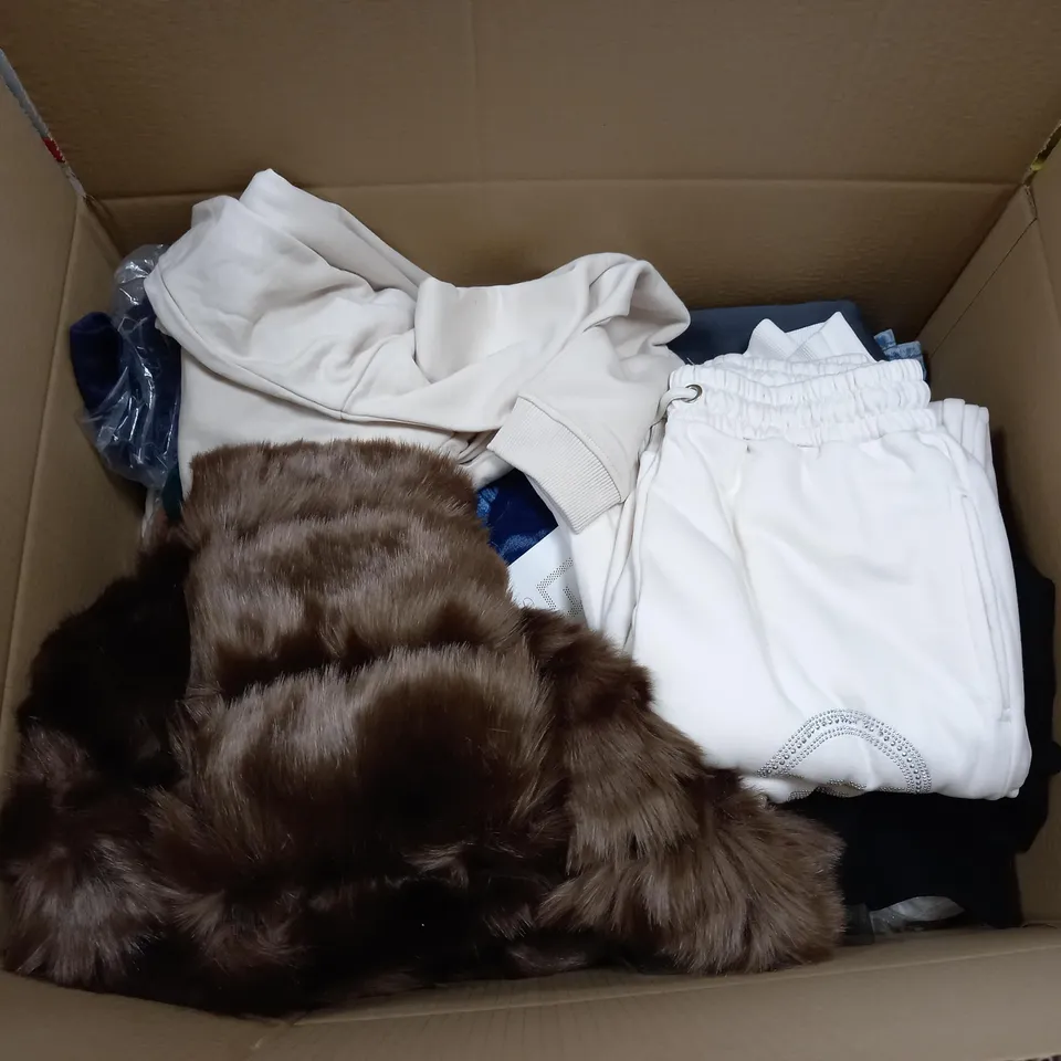 LARGE BOX OF ASSORTED CLOTHING ITEMS IN VARIOUS COLOURS AND SIZES INCLUDING TROUSERS , TOPS AND JUMPERS