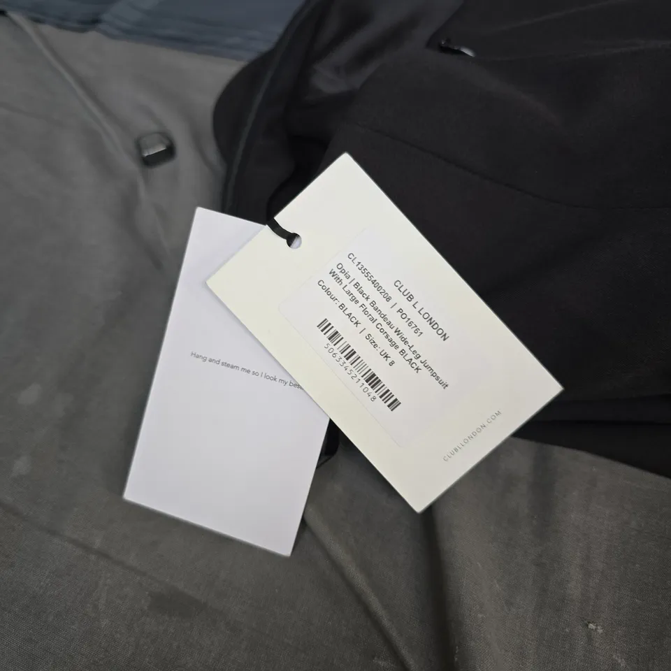 CLUB L LONDON BLACK JUMPSUIT WITH LARGE FLORAL WAIST – UK 8