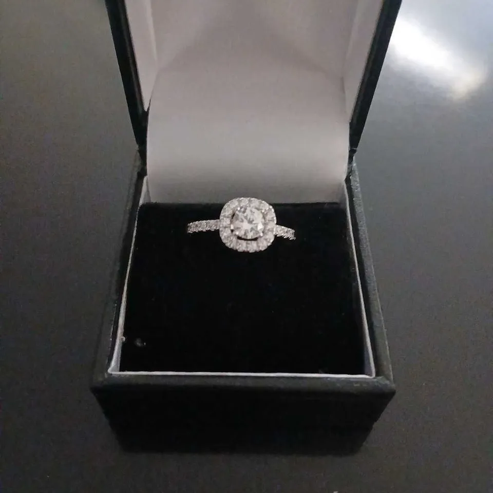 DIAMONIQUE STERLING SILVER RHODIUM PLATED RING