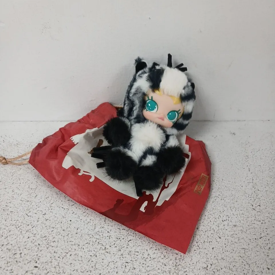 POP MART PLUSH TOY - BLACK & WHITE FAUX WITH BLUE EYES, RED DRAWSTRING BAG