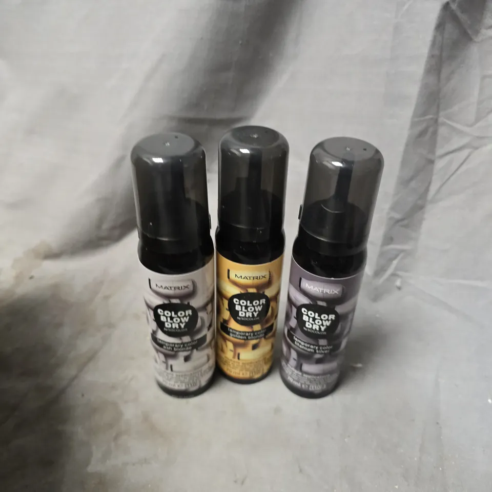 APPROXIMATELY 20 ASSORTED MATRIX BLOW DRY SPRAYS TO INCLUDE ASH BLONDE, TITANIUM SILVER, GOLDEN BLONDE, ETC - COLLECTION ONLY