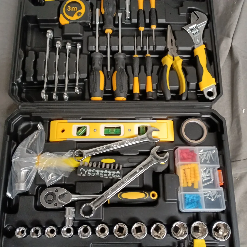 HAND TOOL KIT IN BLACK AND YELLOW CASE WITH SOCKETS, WRENCHES, PLIERS AND SCREWDRIVERS