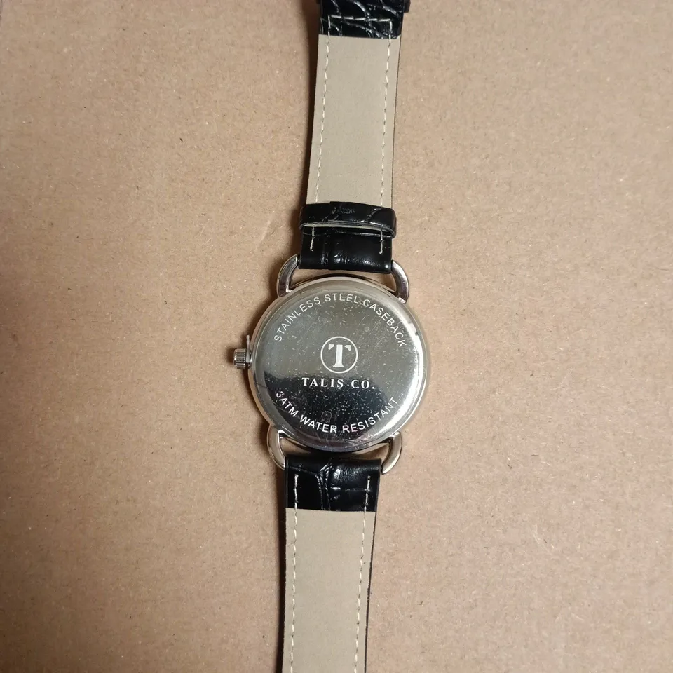 BOXED TALIS CO. WHITE ROMAN DIAL WRISTWATCH WITH BLACK LEATHER STRAP