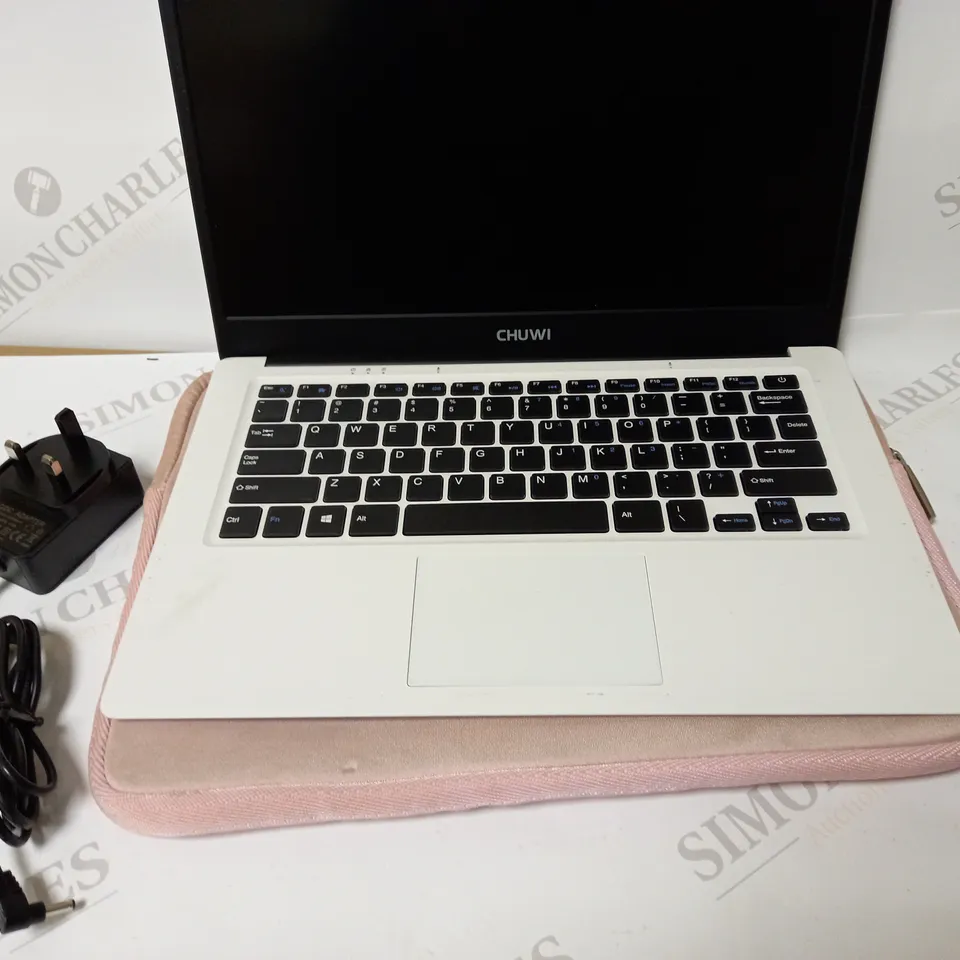 CHUWI WHITE, LAPTOP WITH PINK CASE APPROX. 13.7" SCREEN