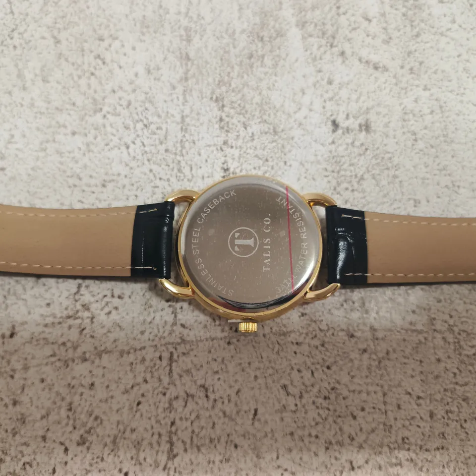 TALIS CO. GOLD-TONE WRISTWATCH IN BLUE BOX, BLACK DIAL & LEATHER STRAP