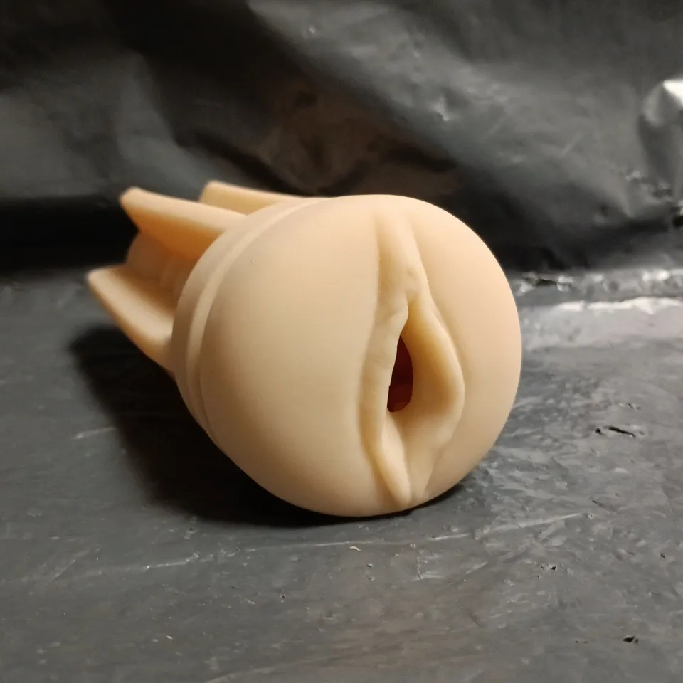 BOXED UNBRANDED SILICONE MASTURBATOR WITH VAGINAL OPENING