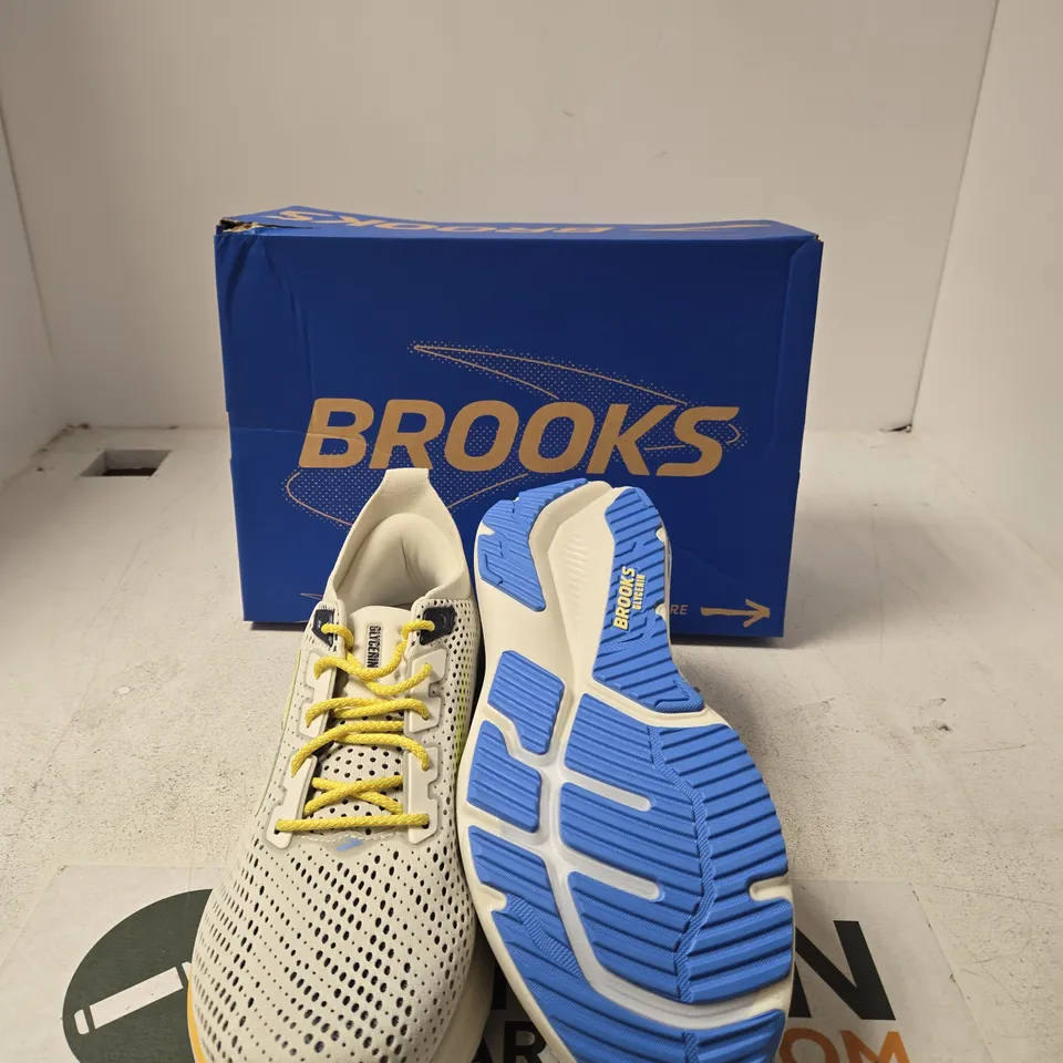 BROOKS RUNNING SHOES – WHITE MESH WITH YELLOW LACES AND BLUE OUTSOLE - UK 10