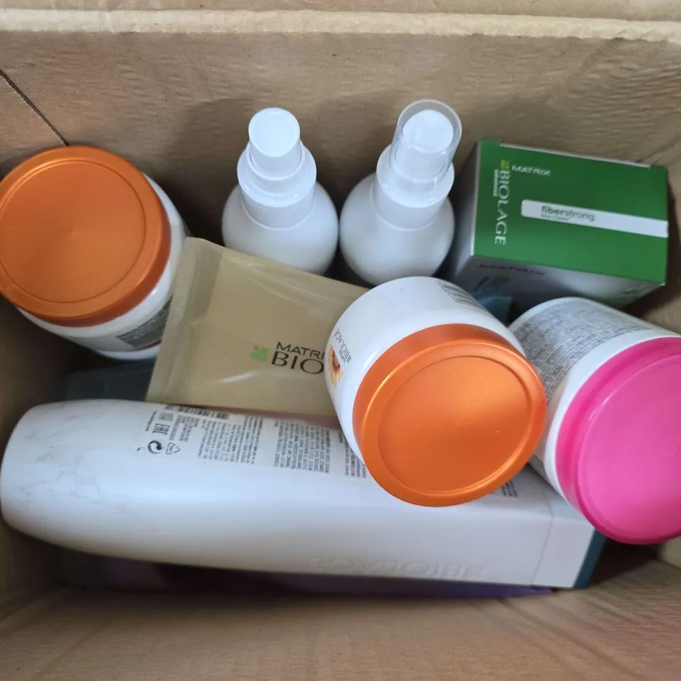 APPROXIMATELY 12 MATRIX BIOLAGE PRODUCTS TO INCLUDE SUNSORIALS SUN REPAIR TREATMENT, VOLUME SHAMPOO, SMOOTH PROOF AQUA GEL, ETC