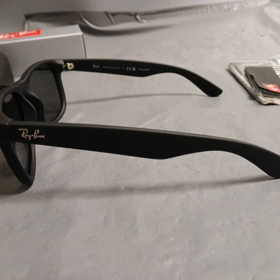 BOXED PAIR OF RAY BAN POLARISED BLACK FRAMED GLASSES