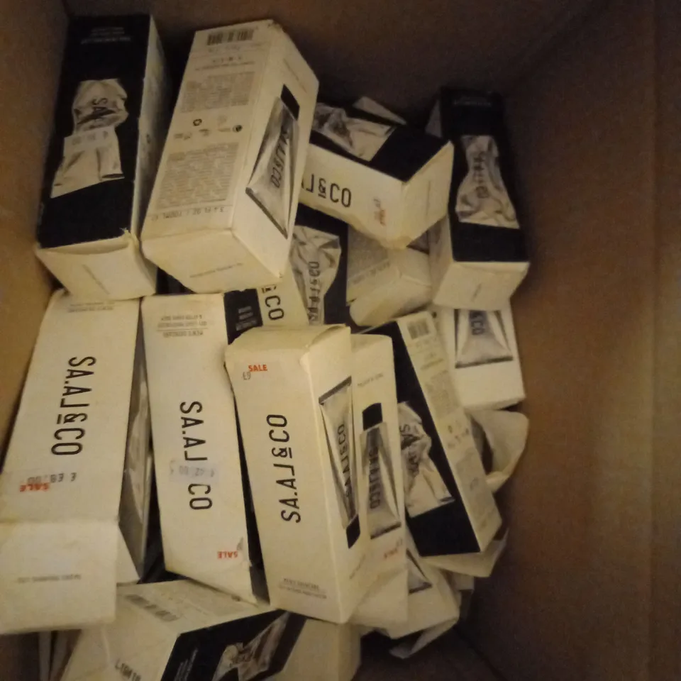 BOX OF APPROXIMATELY 25 SAAL SKINCARE 100ML TUBES OF LIGHT MOISTURIZER & AFTER SHAVE BALM