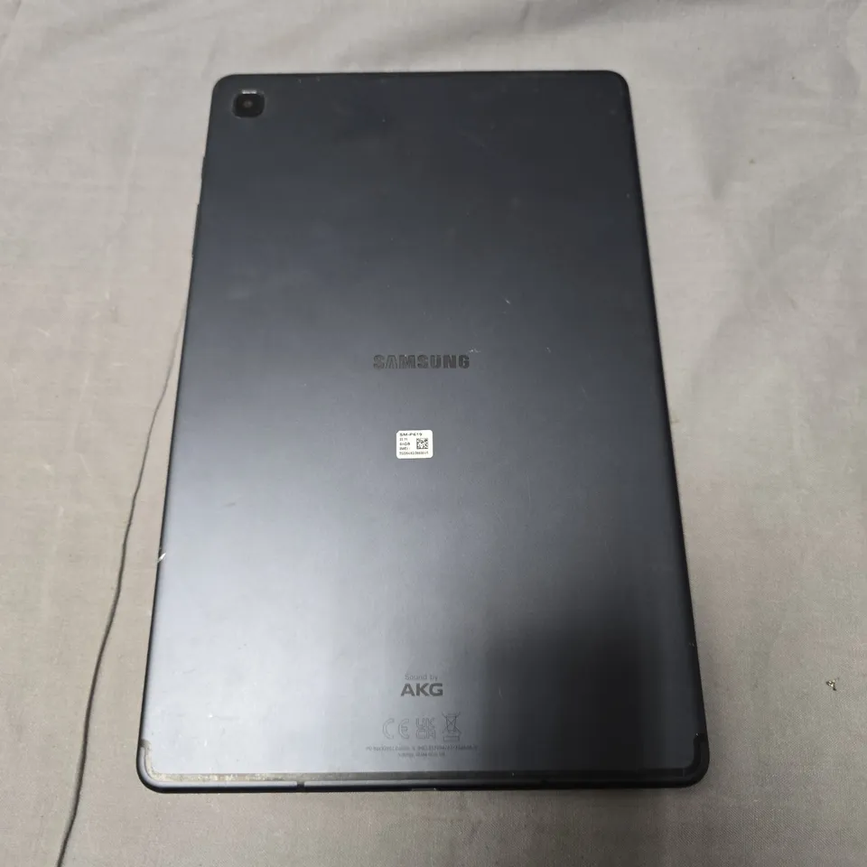 SAMSUNG TABLET – BLACK, REAR VIEW WITH AKG BRANDING 