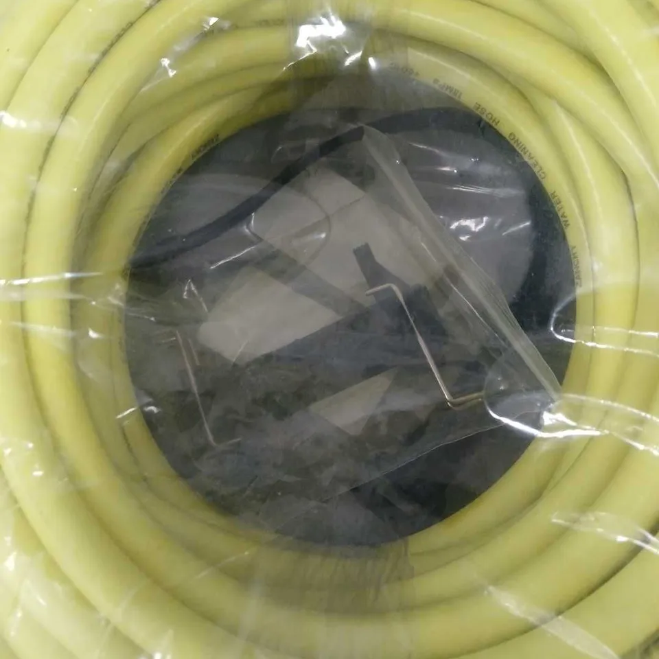 YELLOW GARDEN HOSE WITH SPRAY NOZZLE ATTACHMENTS PLUS SPRINKLER ATTACHMENTS