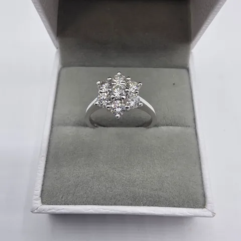 PLATINUM DAISY CLUSTER RING SET WITH NATURAL DIAMONDS WEIGHING +-1.06CT