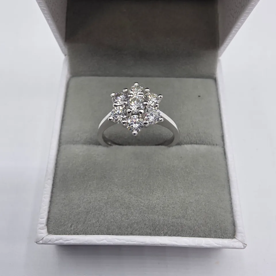 PLATINUM DAISY CLUSTER RING SET WITH NATURAL DIAMONDS WEIGHING +-1.06CT
