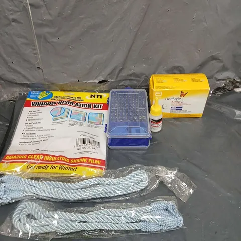 TOTE OF APPROXIMATELY 15 HOUSEHOLD ITEMS TO INCLUDE - WINDOW INSULATION KIT - MINI TOOL KIT - CURTAIN TIE BACKS