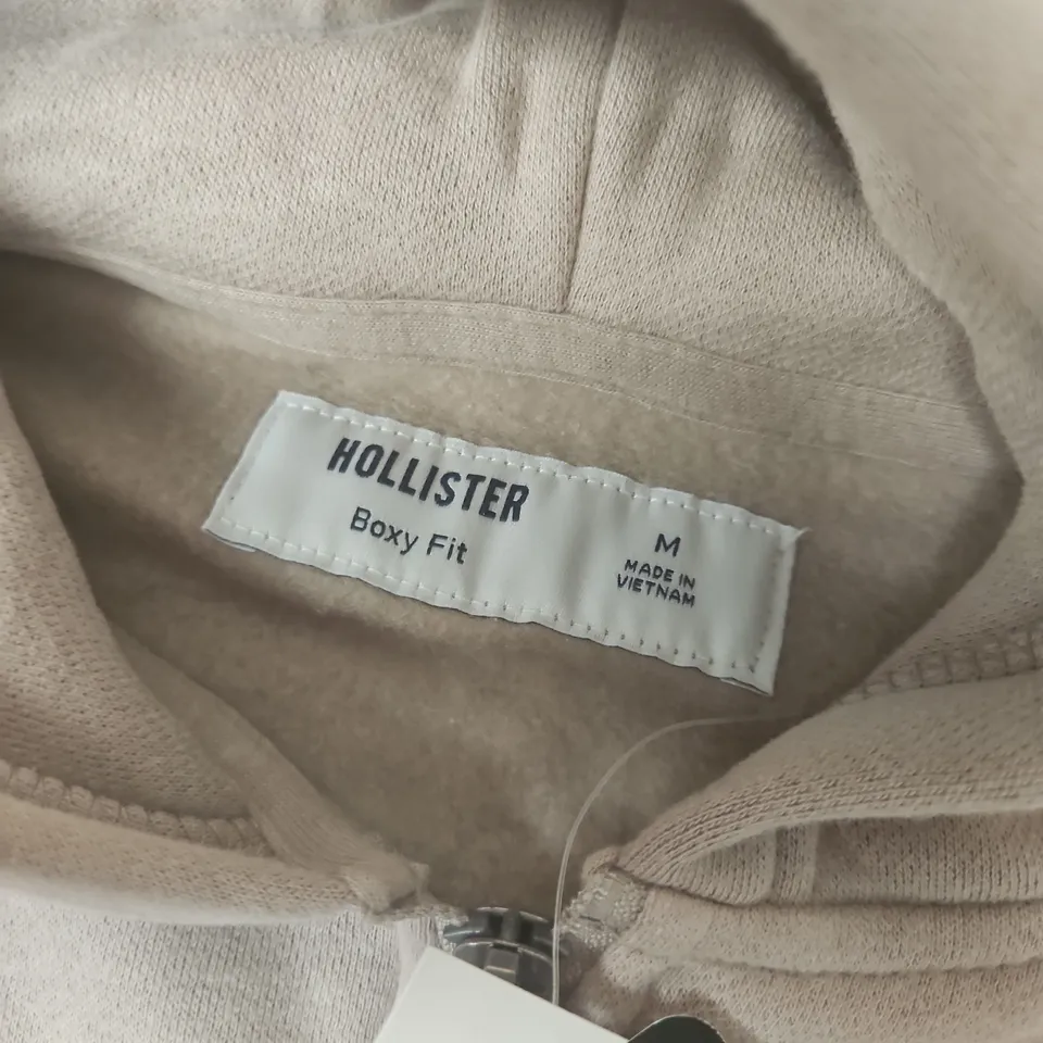 HOLLISTER NASCAR BOXY FIT ZIP HOODIE IN TAUPE - MEDIUM