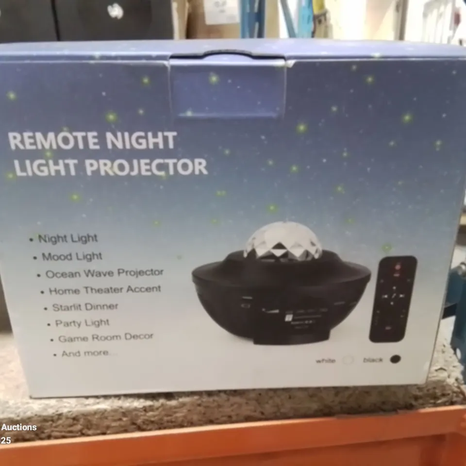 BOXED REMOTE NIGHT LIGHT PROJECTOR 