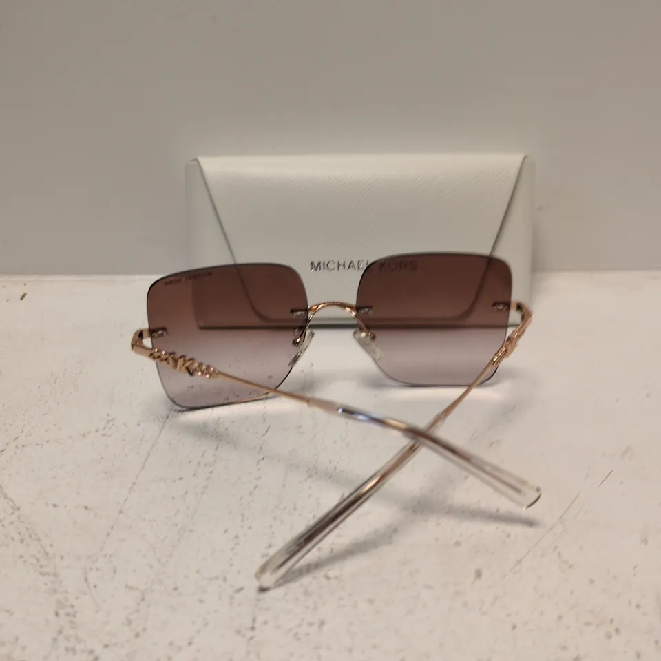 MICHAEL KORS SUNGLASSES – ROSE GOLD RIM, BROWN GRADIENT LENSES