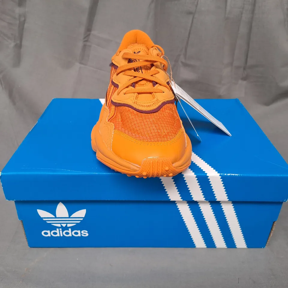 BOXED PAIR OF ADIDAS OZWEEGO SHOES IN ORANGE UK SIZE 6