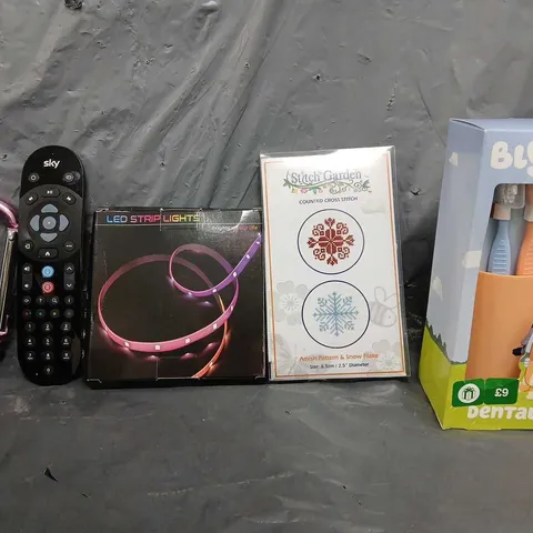 BOX OF APPROXIMATELY 12 ASSORTED ITEMS TO INCLUDE - LED STRIP LIGHT , BLUEY DENTAL SET , SKY REMOTE ETC