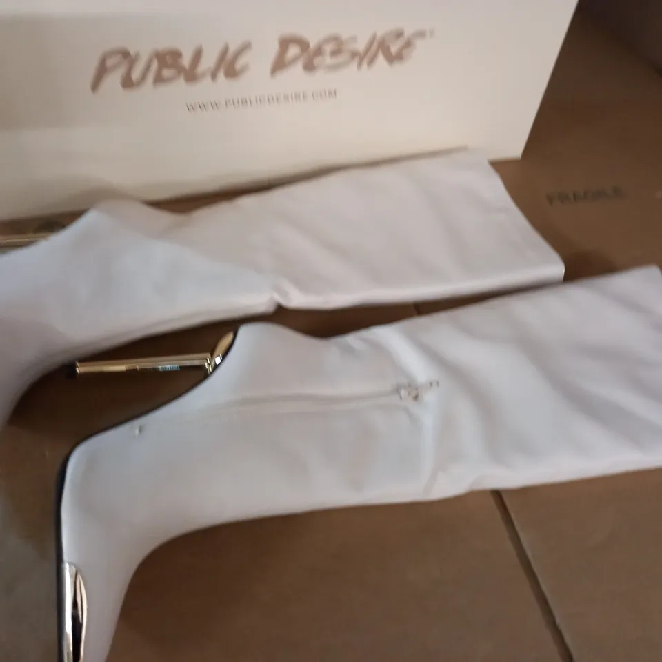 PAIR OF PUBLIC DESIRE TALA BOOTS IN CREAM - UK 7