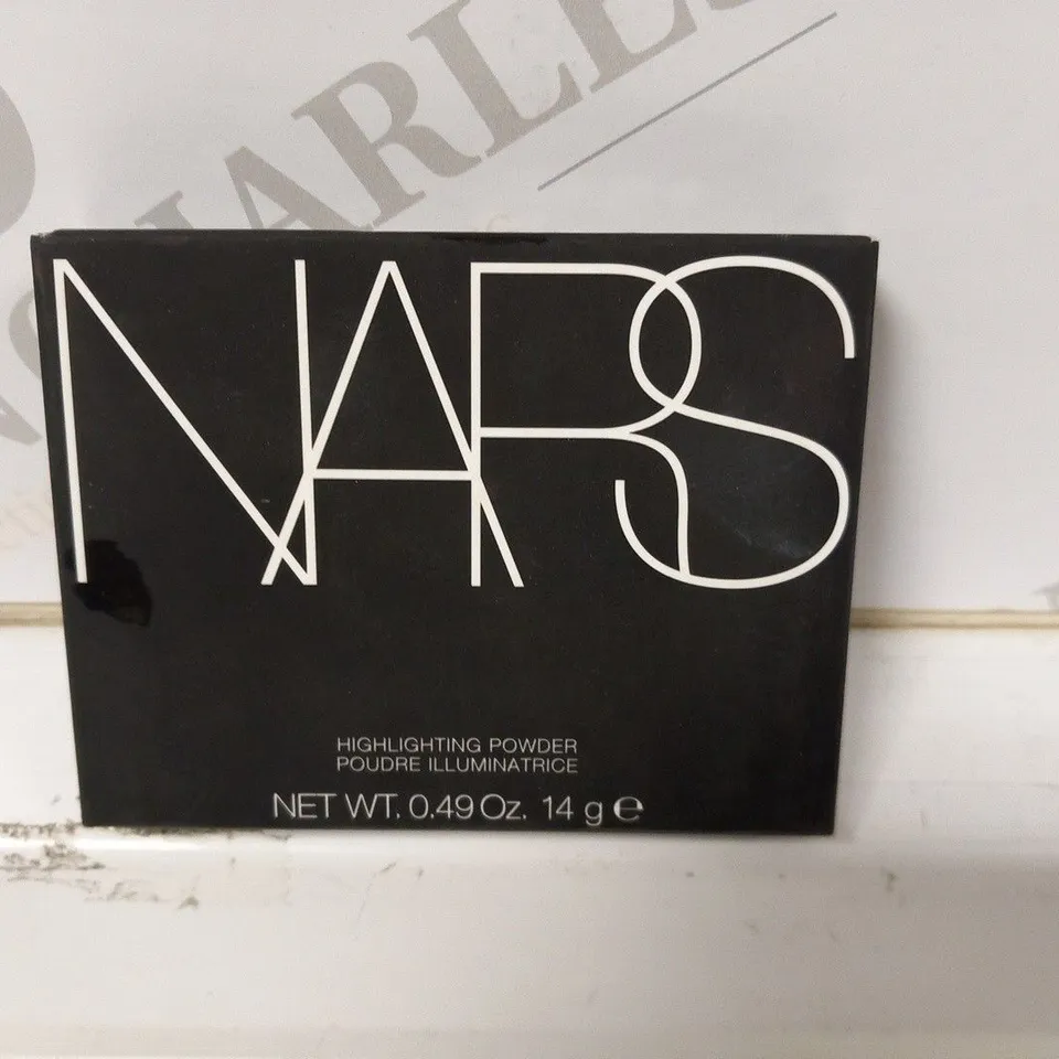 APPROXIMATELY 32 BOXED NARS HIGHLIGHTING POWDER 14G 