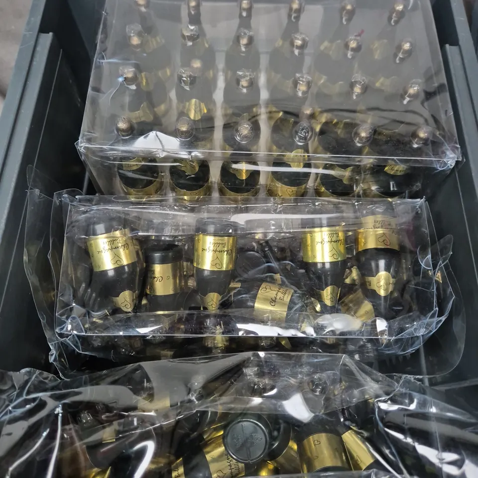 APPROXIMATELY 60 CHAMPAGNE BUBBLE SOLUTION BOTTLES 