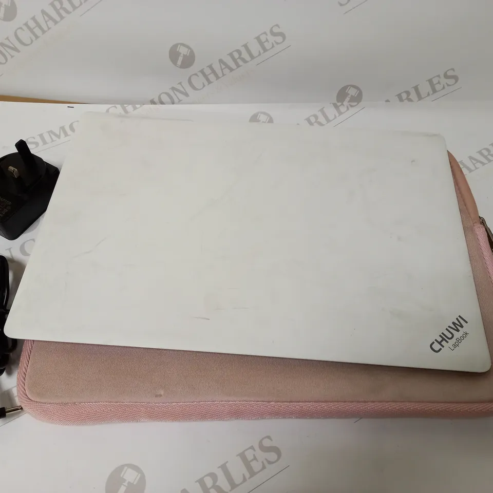 CHUWI WHITE, LAPTOP WITH PINK CASE APPROX. 13.7" SCREEN