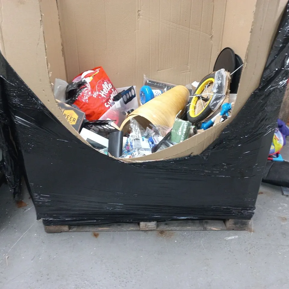 pallet containing a large quantity of assorted household items to include paw patrol kids bike parts, rubber mallet and